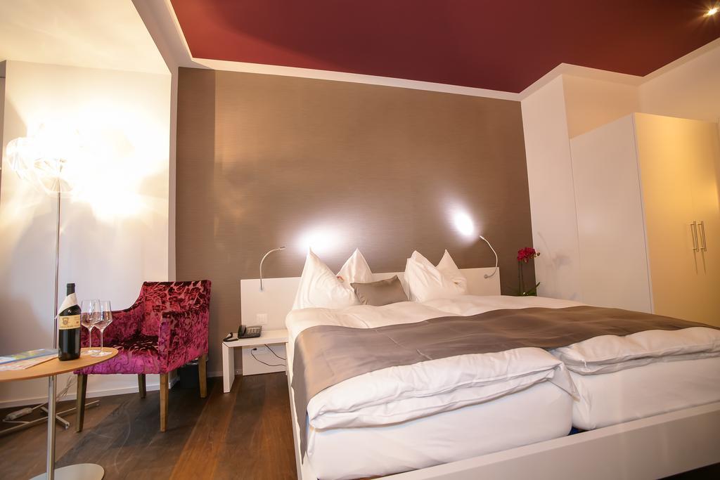 Boutique Hotel - Restaurant Orchidee Burgdorf Pokoj fotografie
